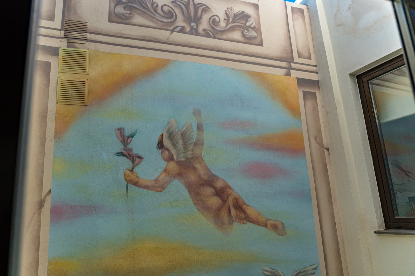Angels mural painted in the inner courtyard